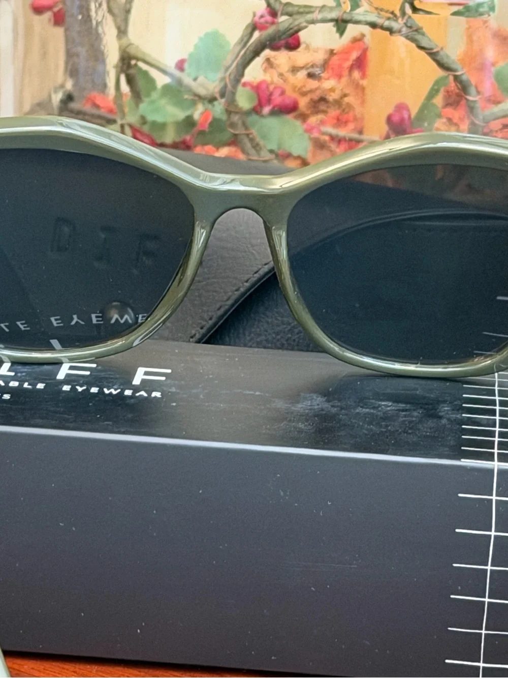 DIFF EYEWEAR Cassidy Sunglasses in an olive green color with polarized lenses